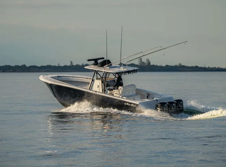Mr Fish Yacht Photos Pics 2016 SeaHunter 35 Tournament boat cruising on calm water.