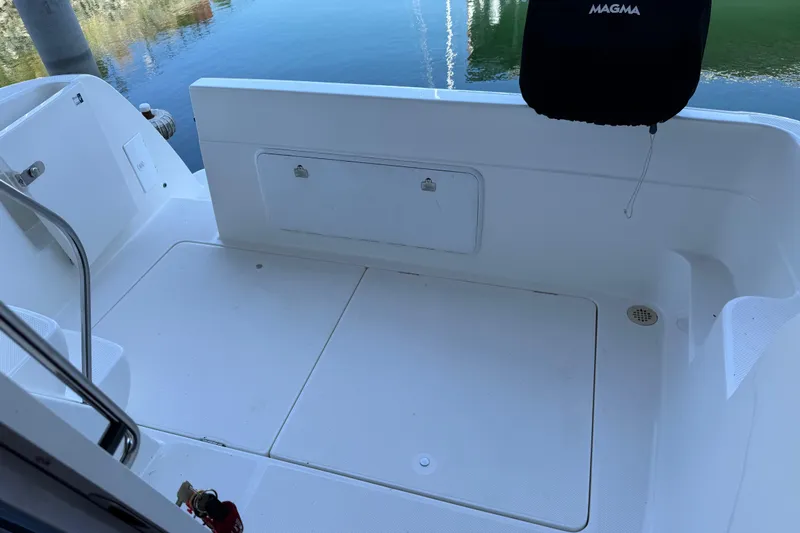  Yacht Photos Pics 2005 Meridian 341 Sedan boat deck with clean white surface and railing.