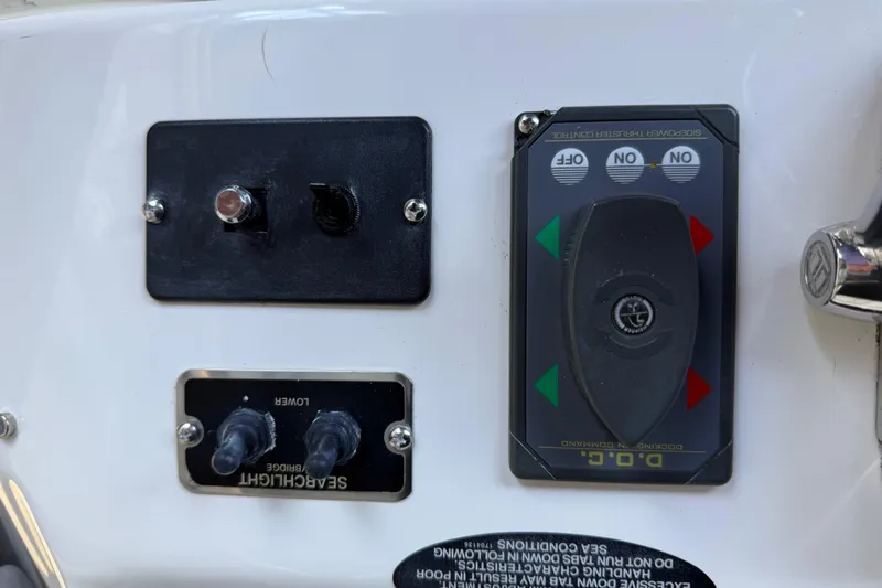  Yacht Photos Pics Control panel on a 2005 Meridian 341 Sedan boat with switches and indicators.