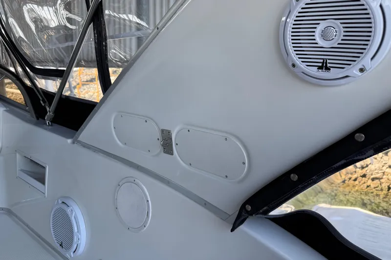  Yacht Photos Pics 2005 Meridian 341 Sedan interior with speakers and window details.