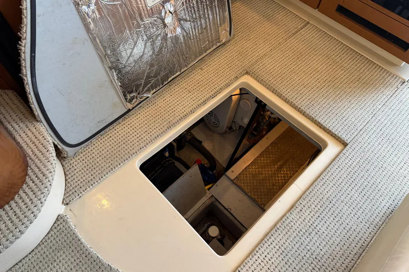  Yacht Photos Pics 2005 Meridian 341 Sedan engine compartment with open hatch, revealing interior components.