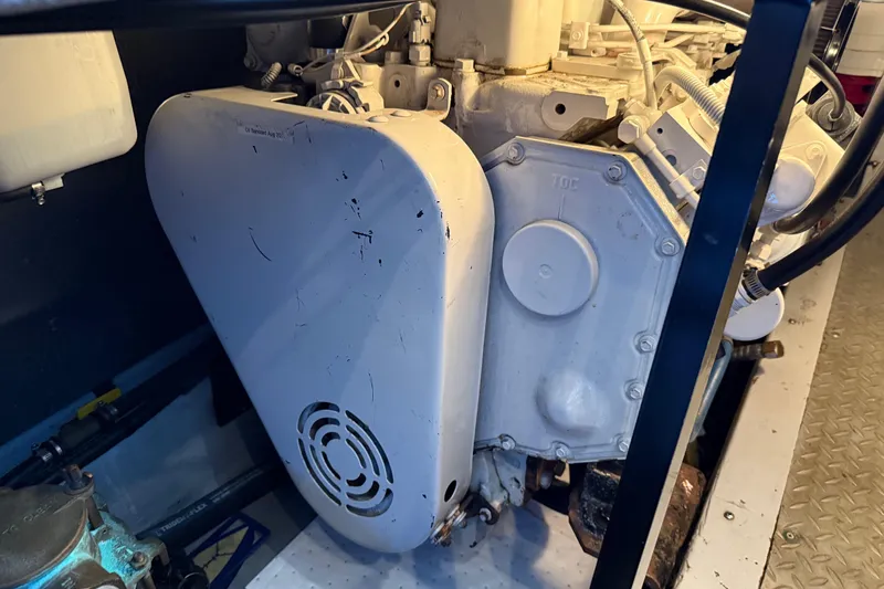  Yacht Photos Pics Engine compartment of a 2005 Meridian 341 Sedan boat, showcasing mechanical components.