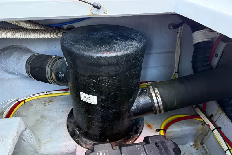  Yacht Photos Pics Engine compartment of a 2005 Meridian 341 Sedan with visible hoses and wiring.