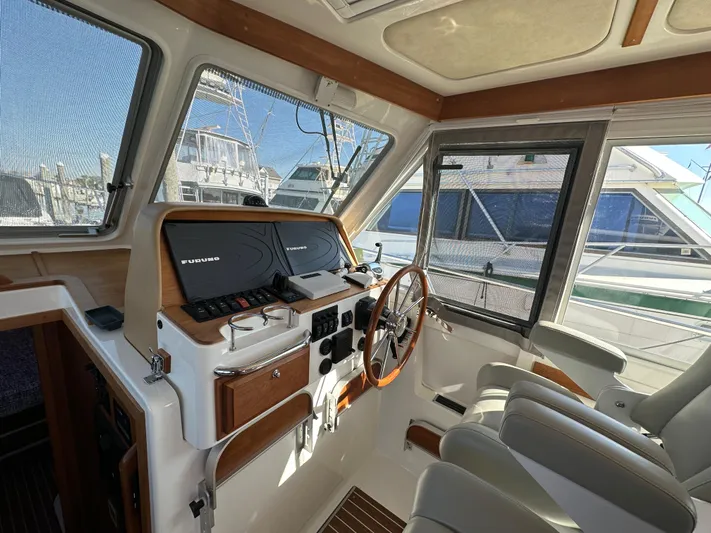 Rolling Stone Yacht Photos Pics 2017 Back Cove 41 yacht helm with modern controls and comfortable seating.
