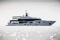Luxurious 2007 Austal Displacement yacht on shimmering water.