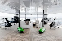 Luxurious yacht deck with jet skis and seating, Austal Displacement 2007 model.