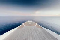 Austal Displacement yacht deck, 2007, with helipad, overlooking calm ocean and sky.