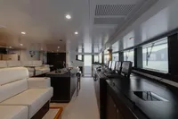 Luxurious interior of 2007 Austal Displacement yacht with modern seating and navigation equipment.