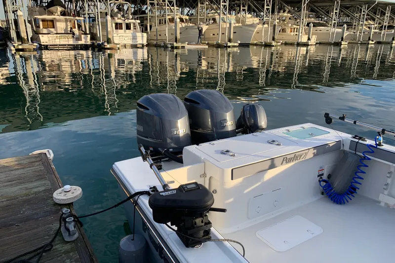 Fortuna Yacht Photos Pics 2019 Parker 2820 XLD Sport Cabin boat docked with twin Yamaha 300 engines.