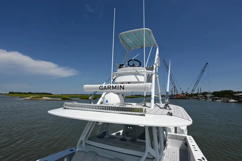  Yacht Photos Pics Freeman 37VH 2021 boat with Garmin equipment on a sunny day by the water.