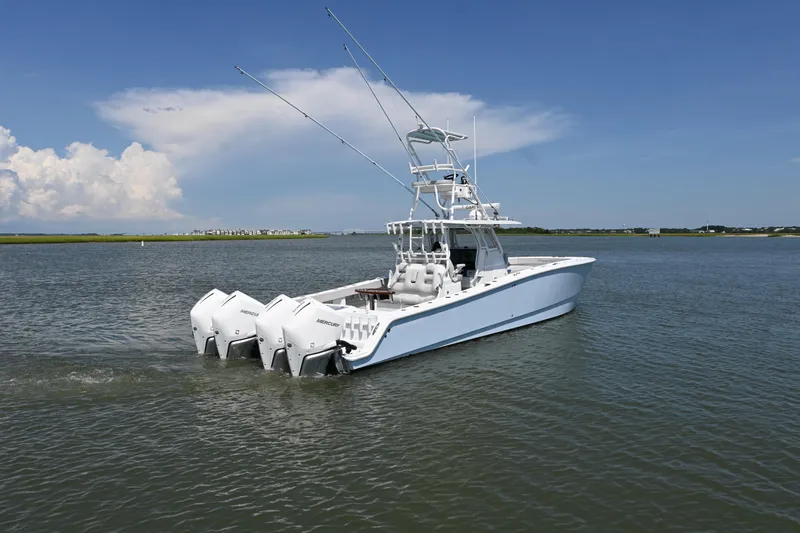  Yacht Photos Pics 2021 Freeman 37VH boat with multiple outboard engines on calm water.