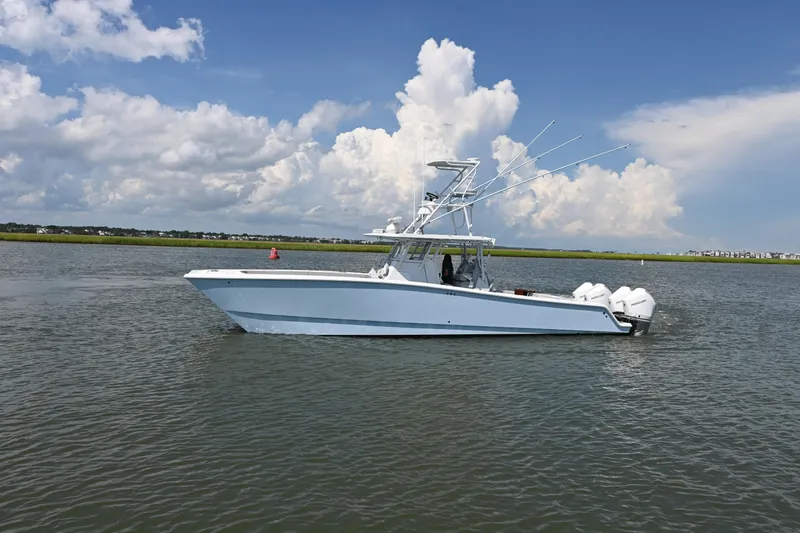  Yacht Photos Pics Freeman 37VH 2021 boat on calm water under a cloudy sky.