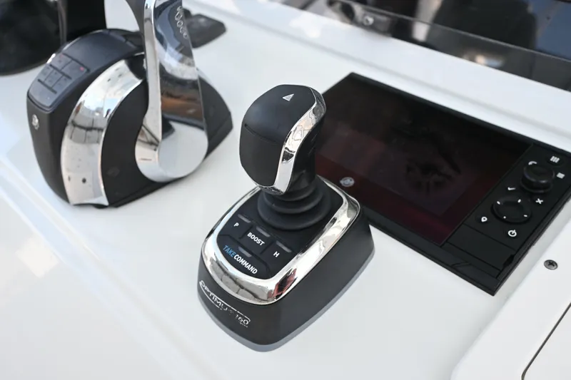  Yacht Photos Pics Control panel of a 2021 Freeman 37VH boat with joystick and throttle.