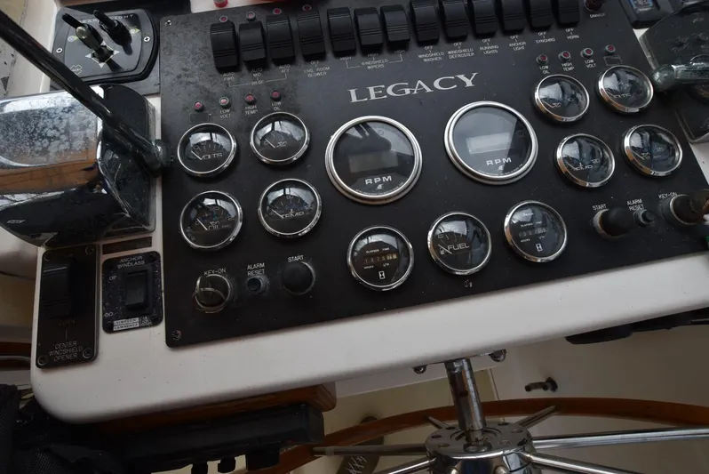 Don't Blink Yacht Photos Pics Legacy 34 Express 1999 boat dashboard with gauges and controls.