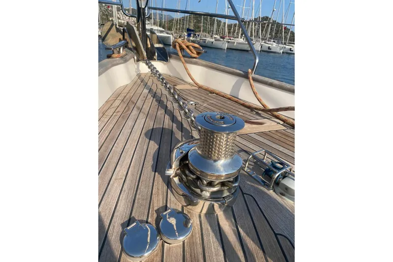  Yacht Photos Pics Deck of 2007 Hallberg-Rassy 54 yacht with anchor winch and chain.