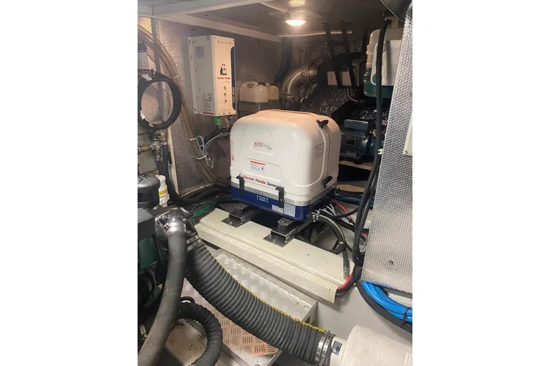  Yacht Photos Pics Engine room of 2007 Hallberg-Rassy 54 yacht with Fischer Panda generator.