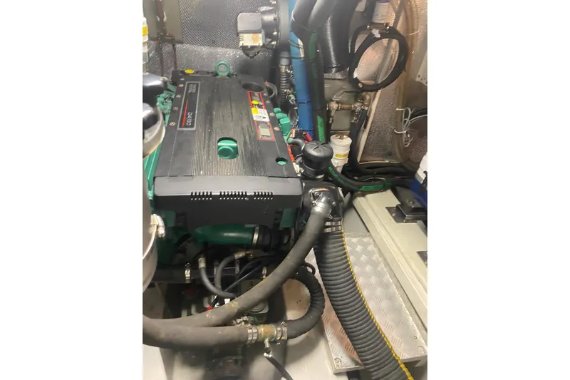  Yacht Photos Pics Engine room of a 2007 Hallberg-Rassy 54 yacht, featuring a Volvo Penta engine.