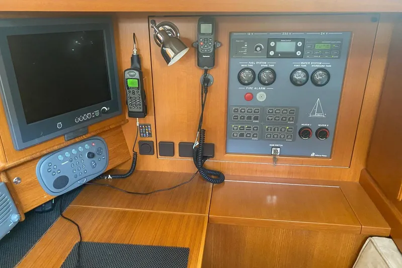  Yacht Photos Pics Control panel of a 2007 Hallberg-Rassy 54 yacht with navigation equipment.