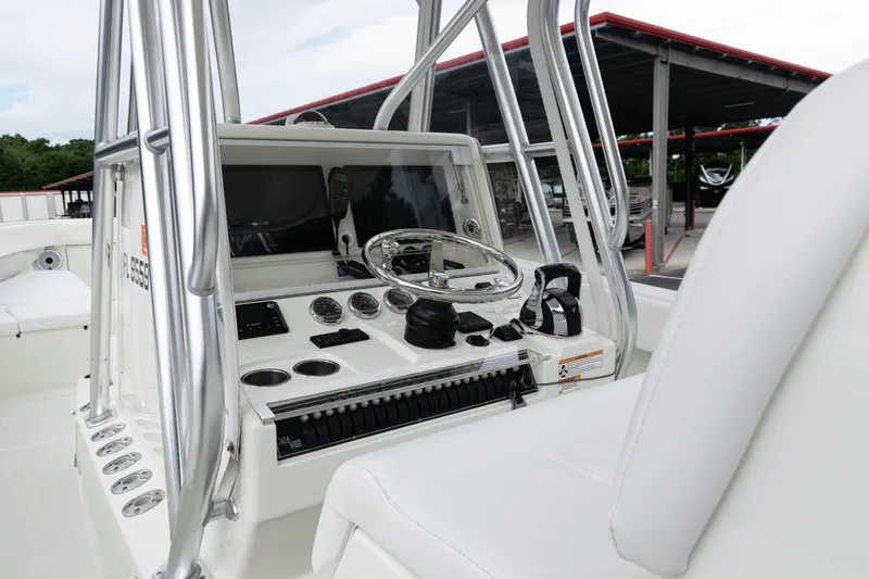  Yacht Photos Pics 2017 SeaVee 340Z boat cockpit with steering wheel and control panel.