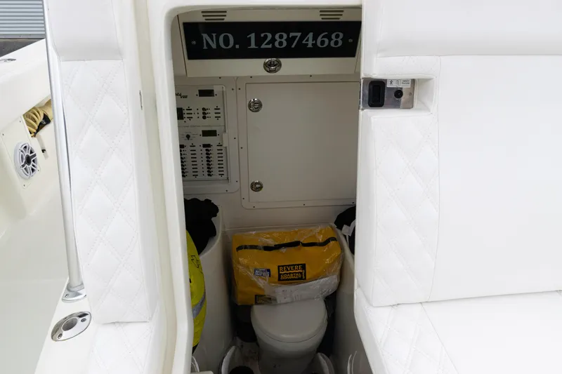  Yacht Photos Pics 2017 SeaVee 340Z boat interior with storage, control panel, and life-saving equipment.