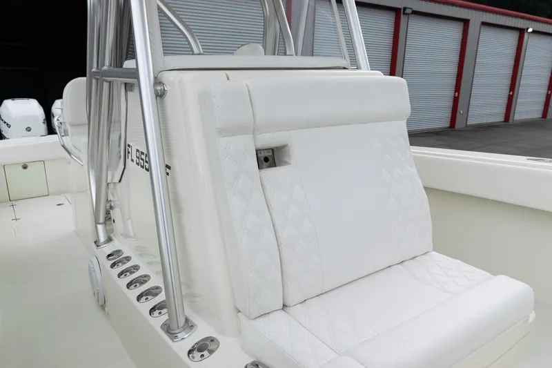  Yacht Photos Pics 2017 SeaVee 340Z boat with white cushioned seating and stainless steel frame.
