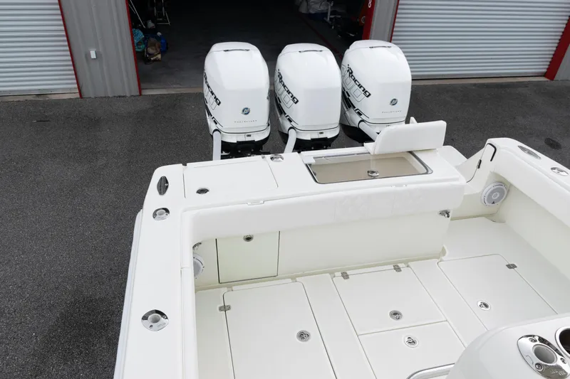 Yacht Photos Pics 2017 SeaVee 340Z boat with triple outboard engines in storage facility.