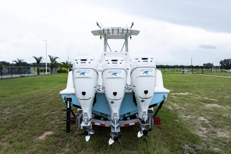  Yacht Photos Pics 2017 SeaVee 340Z boat with triple 400R engines on grassy field.