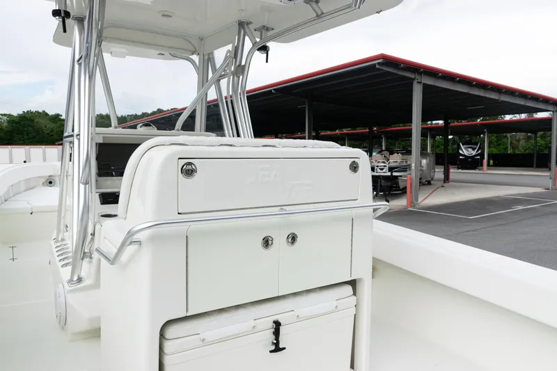  Yacht Photos Pics 2017 SeaVee 340Z boat interior with storage compartments, parked in a covered marina.