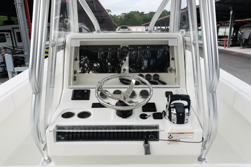  Yacht Photos Pics 2017 SeaVee 340Z boat console with steering wheel and controls.