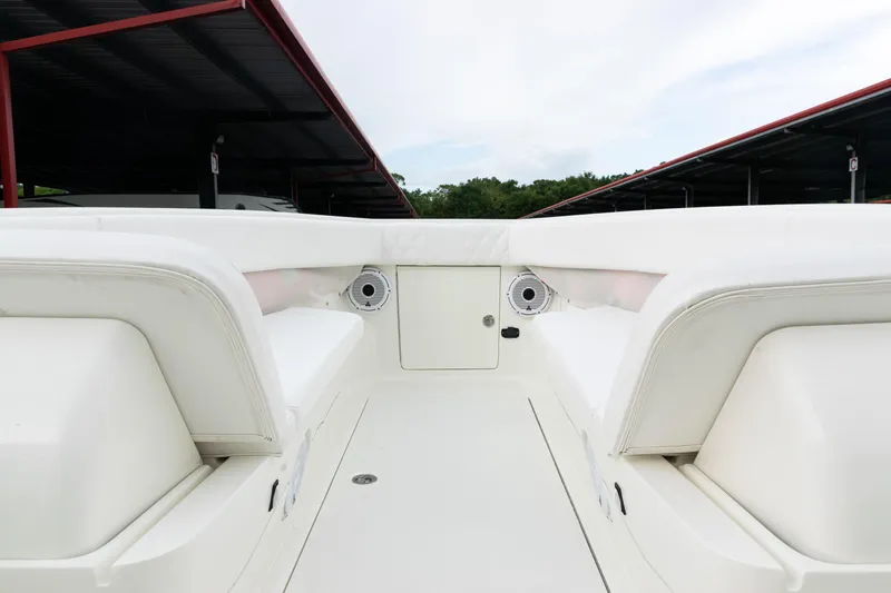  Yacht Photos Pics 2017 SeaVee 340Z boat interior with white seating and speakers, under covered dock.