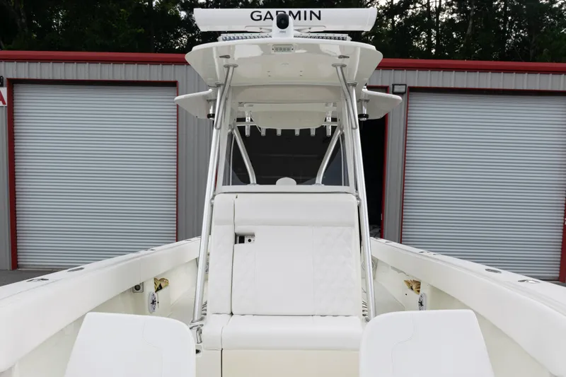  Yacht Photos Pics 2017 SeaVee 340Z boat with Garmin equipment, docked near storage units.