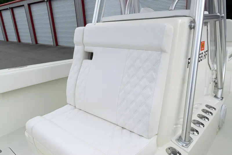  Yacht Photos Pics 2017 SeaVee 340Z boat with white cushioned seating and stainless steel railings.