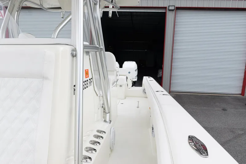  Yacht Photos Pics 2017 SeaVee 340Z boat interior with white seating and rod holders.