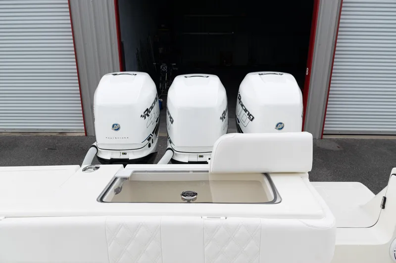  Yacht Photos Pics 2017 SeaVee 340Z boat with triple outboard engines in a storage facility.