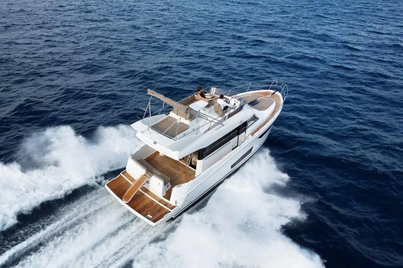  Yacht Photos Pics Manufacturer Provided Image: 2017 Jeanneau Velasco 43 yacht cruising on open water.