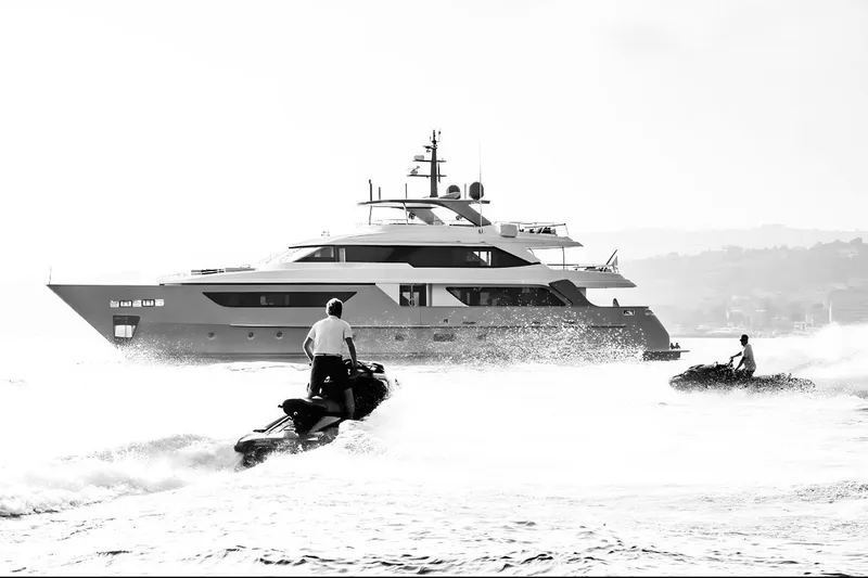  Yacht Photos Pics Luxury Sanlorenzo SD126 yacht with jet skis in action, 2022 model, on open water.