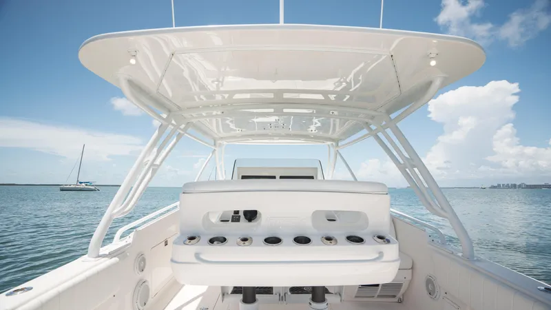  Yacht Photos Pics 2013 Intrepid 400 Cuddy boat interior with ocean view and clear sky.