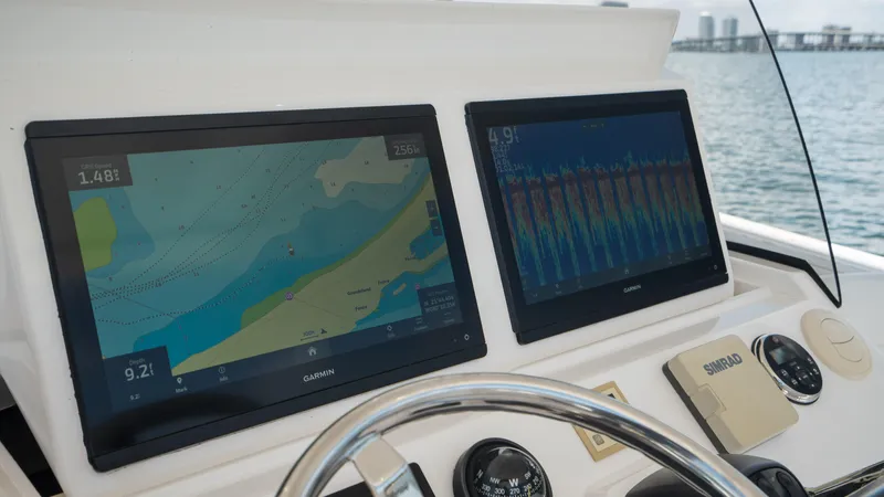  Yacht Photos Pics Intrepid 400 Cuddy 2013 helm with dual Garmin navigation displays.