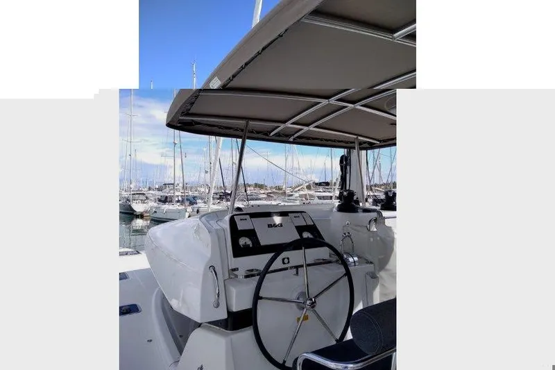 Stolos Yacht Photos Pics 2020 Lagoon 42 yacht helm station with marina view.