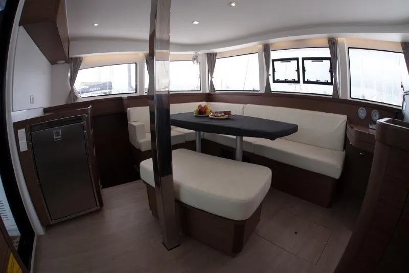 Stolos Yacht Photos Pics Interior of 2020 Lagoon 42 catamaran with modern seating and dining area.