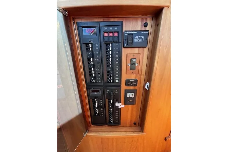 Independence Yacht Photos Pics Electrical panel on 2012 Sabre 42 Salon Express yacht, featuring switches and controls.