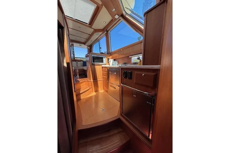 Independence Yacht Photos Pics Interior of 2012 Sabre 42 Salon Express yacht with wood finish and modern amenities.