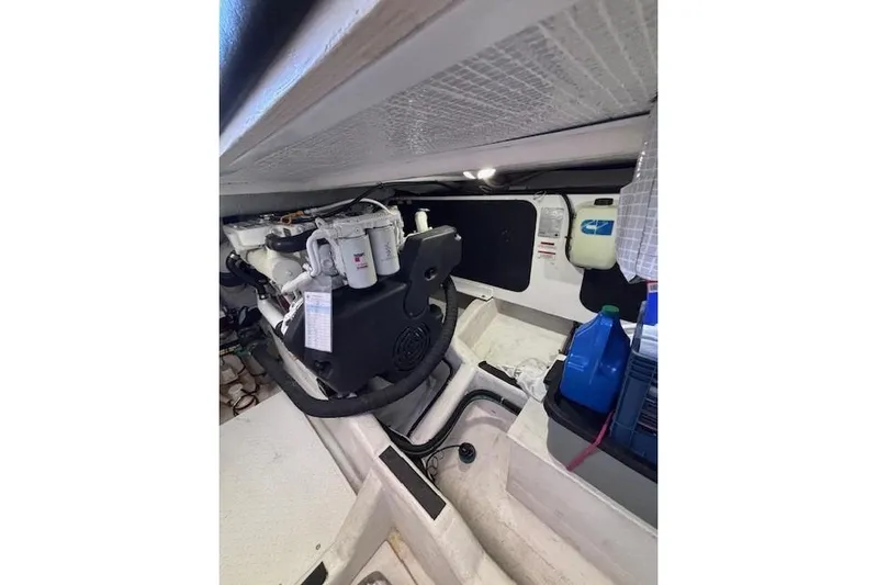 Independence Yacht Photos Pics Engine room of 2012 Sabre 42 Salon Express with visible components and storage.