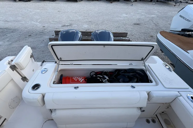  Yacht Photos Pics 2018 Grady-White Canyon 306 boat storage compartment with gear and equipment.