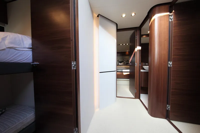  Yacht Photos Pics Interior of 2018 Princess S65 yacht with wooden doors and modern design.