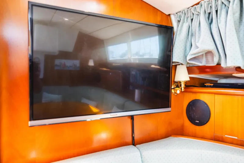  Yacht Photos Pics Interior of 2000 Beneteau Oceanis 40 CC yacht with mounted flat-screen TV.