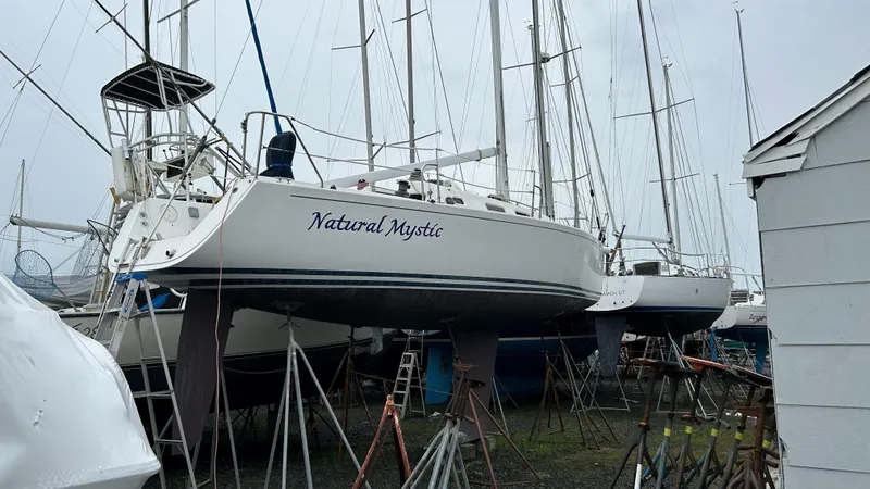 Natural Mystic Yacht Photos Pics 2003 J Boats J/109 sailboat "Natural Mystic" on stands in a boatyard.