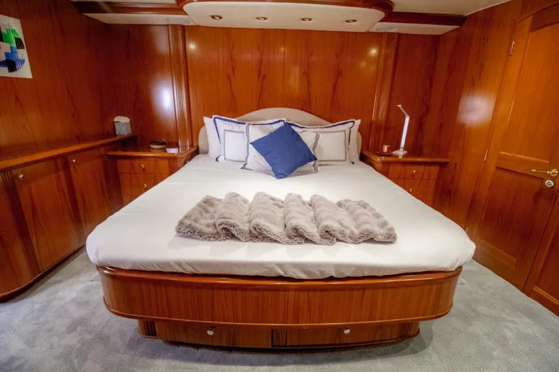 Reel Deal Yacht Photos Pics Luxurious cabin interior of 2005 Sea Force Sportfish yacht with elegant wood paneling.