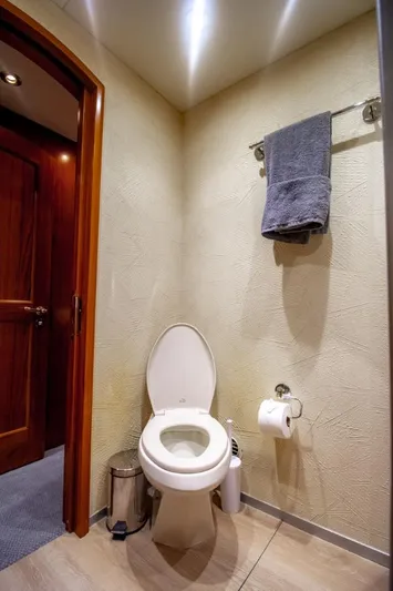 Reel Deal Yacht Photos Pics 2005 Sea Force Sportfish bathroom with toilet, towel, and modern fixtures.