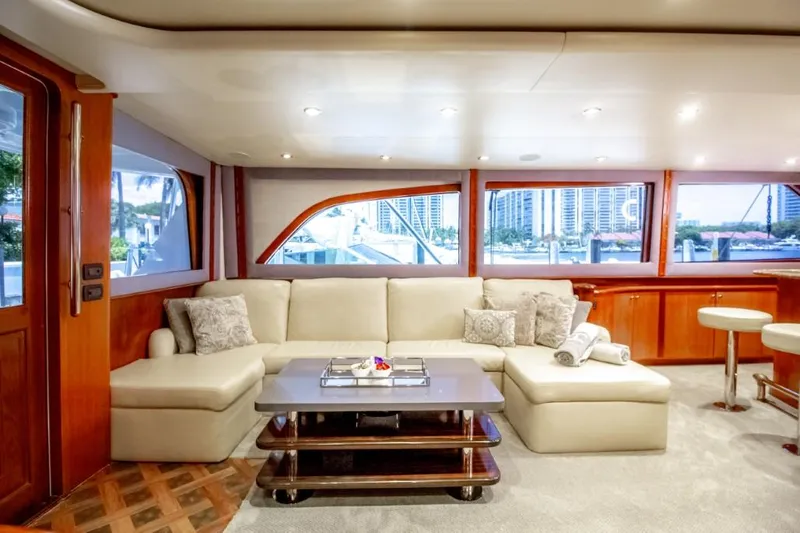 Reel Deal Yacht Photos Pics Luxurious 2005 Sea Force Sportfish yacht interior with plush seating and elegant decor.